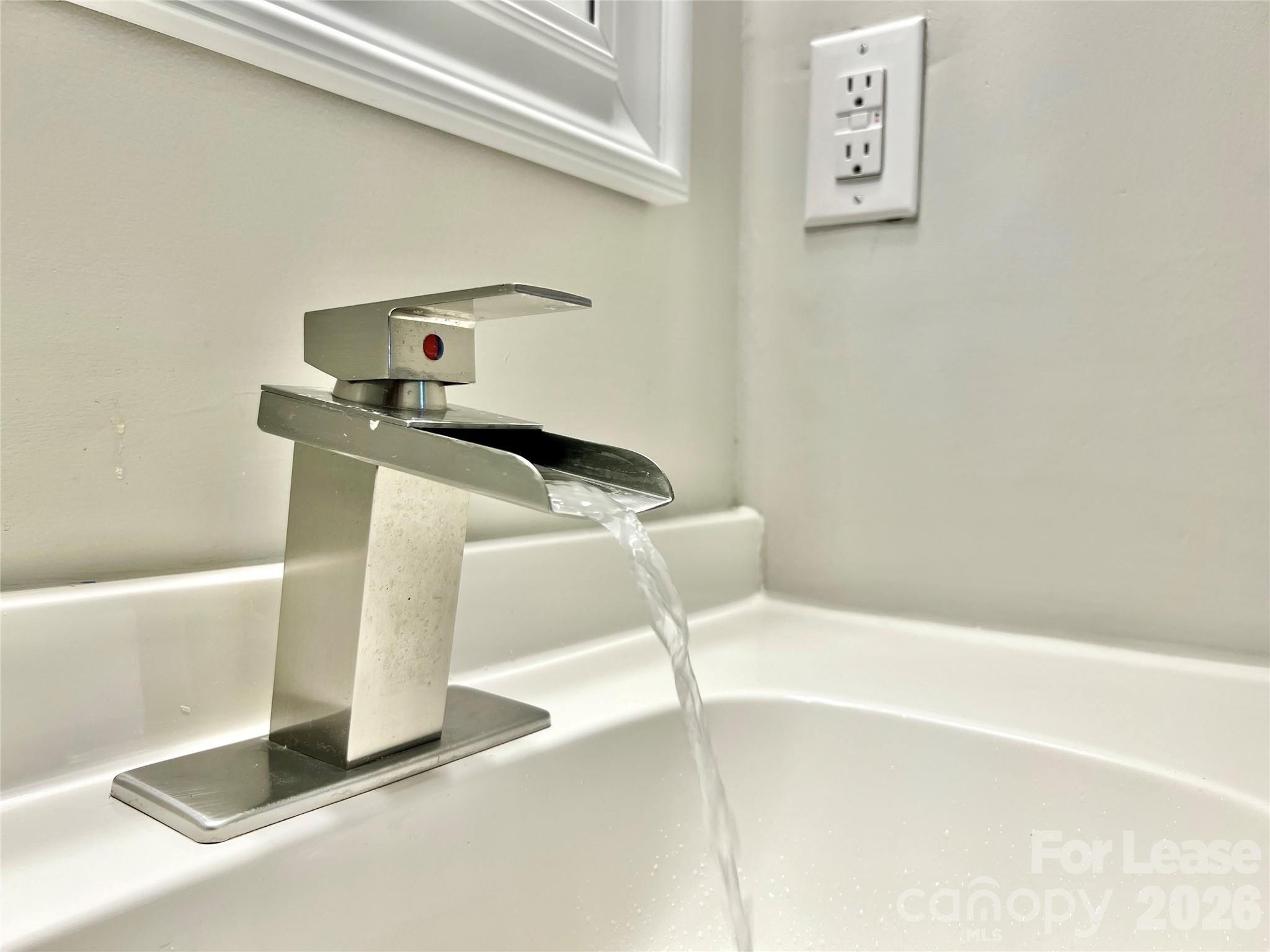 11084 Harrowfield Road Charlotte, NC 28226 - Photo 24 of 31 a white bath tub sitting next to a white wall
