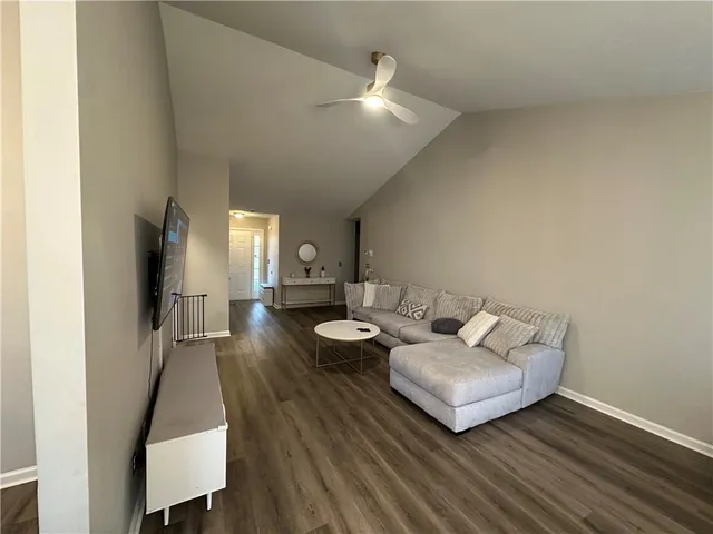 a kitchen with a sink and a stove top oven