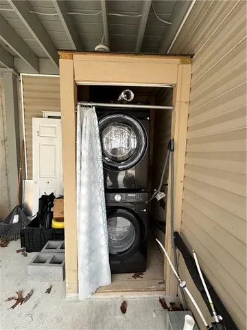 a kitchen with a stove and a refrigerator