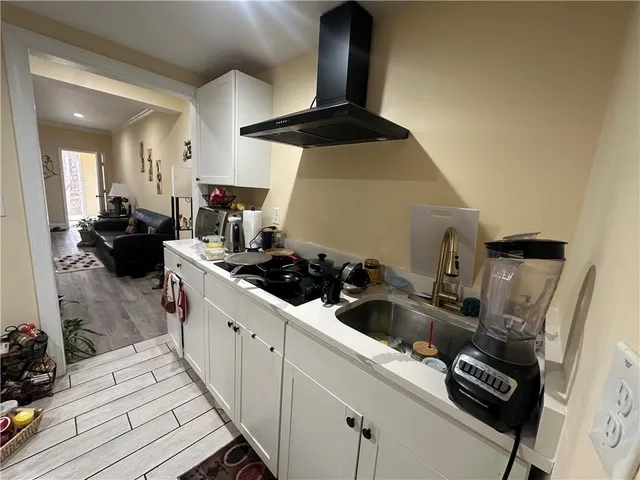 a bed room with furniture and a window