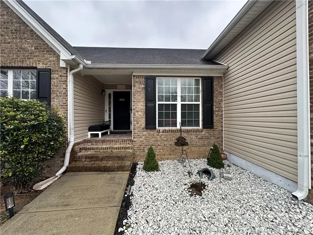 a front view of a house with a window