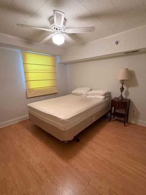 1777 Rosalind Drive Northeast Atlanta, GA 30329 - Photo 16 of 29 a bedroom with a bed and a chandelier
