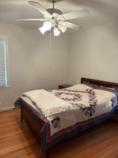 1777 Rosalind Drive Northeast Atlanta, GA 30329 - Photo 18 of 29 a bedroom with a bed and a chandelier