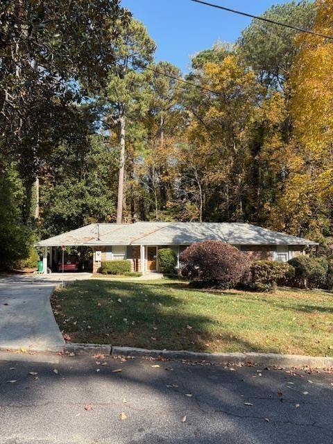 1777 Rosalind Drive Northeast Atlanta, GA 30329 - Photo 2 of 29 a view of a house with a big yard
