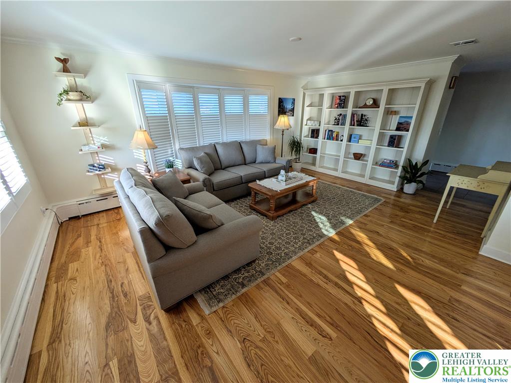 3285 Cherryville Road Northampton, PA 18067 - Photo 16 of 51 Rich hardwood floors in a light-filled gathering space.