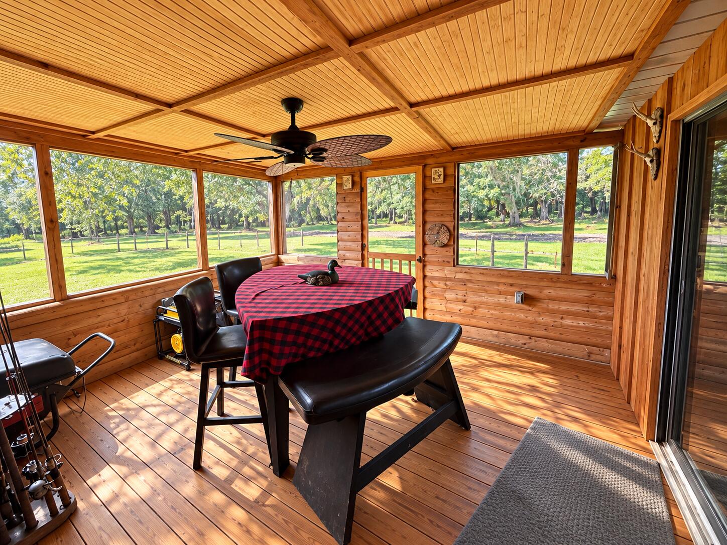 1042 Arbuckle Branch Road Sebring, FL 33870 - Photo 20 of 43 Sunlit Rustic Screened Porch Retreat