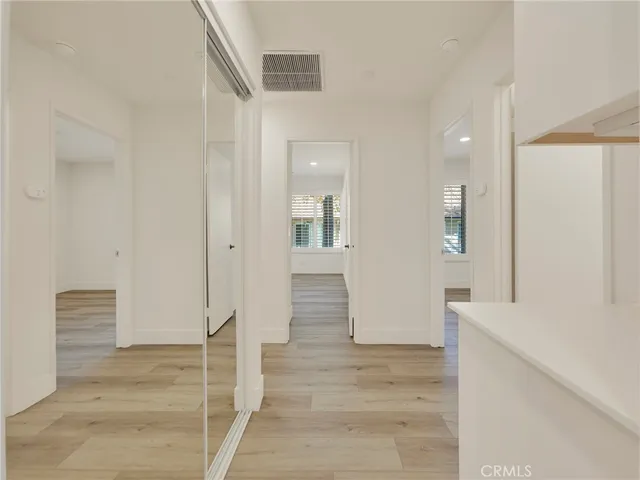 a bathroom with a shower and a sink