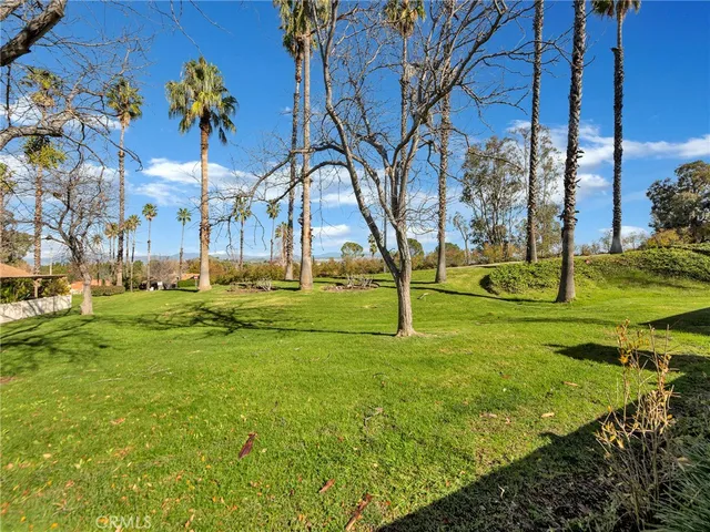 a view of street with tall buildings