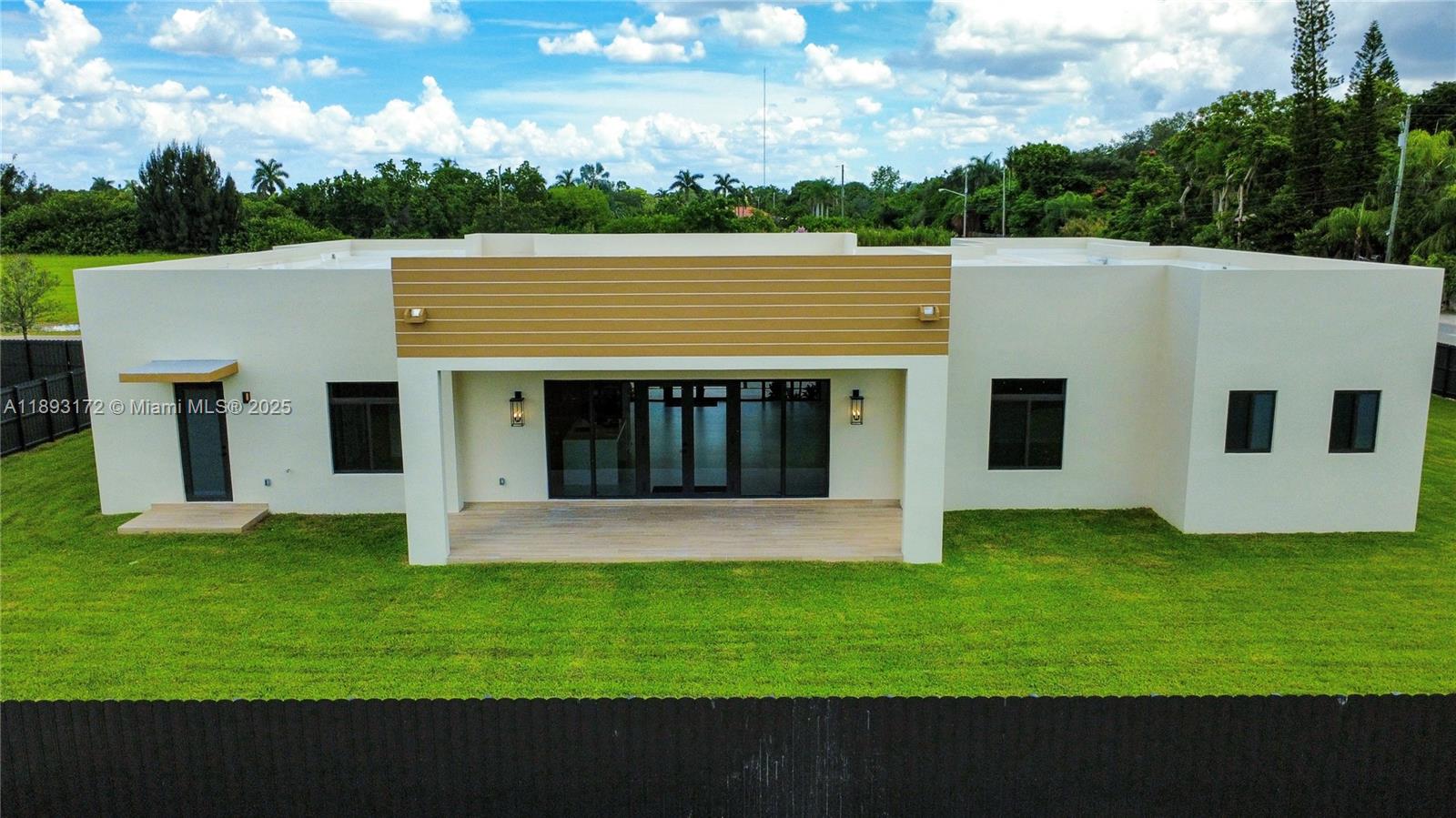 17354 Southwest 287th Street Homestead, FL 33030 - Photo 5 of 22 a view of house with yard and entertaining space