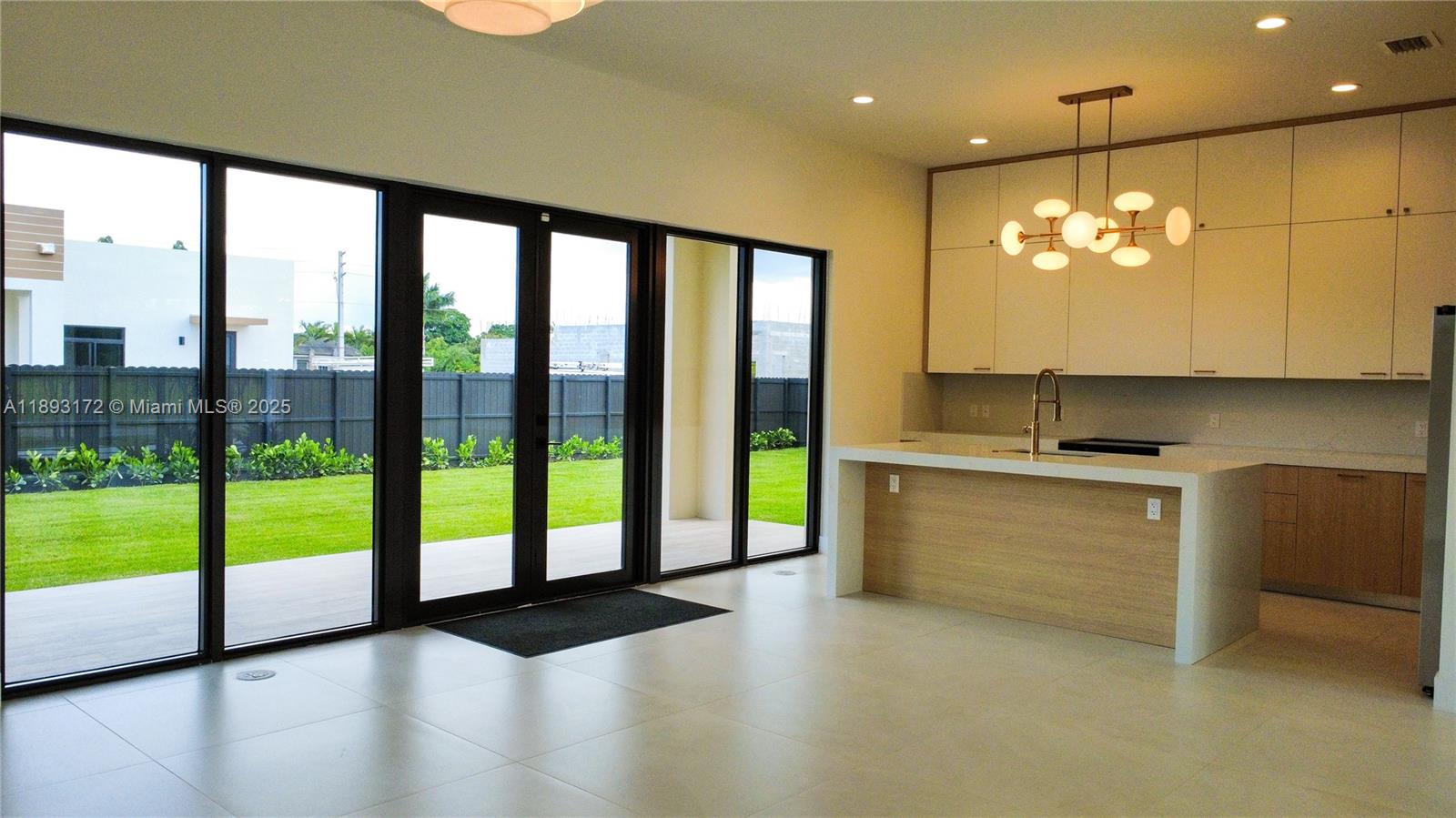 17354 Southwest 287th Street Homestead, FL 33030 - Photo 7 of 22 a view of an entryway with kitchen