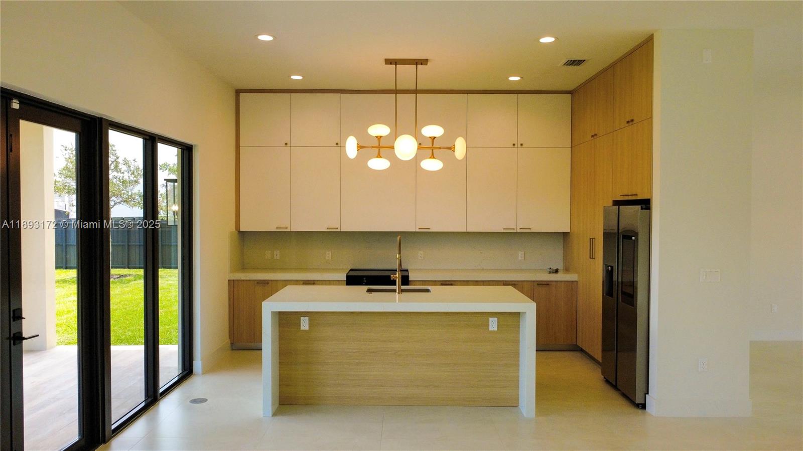 17354 Southwest 287th Street Homestead, FL 33030 - Photo 10 of 22 a bathroom with a sink a large mirror and a shower