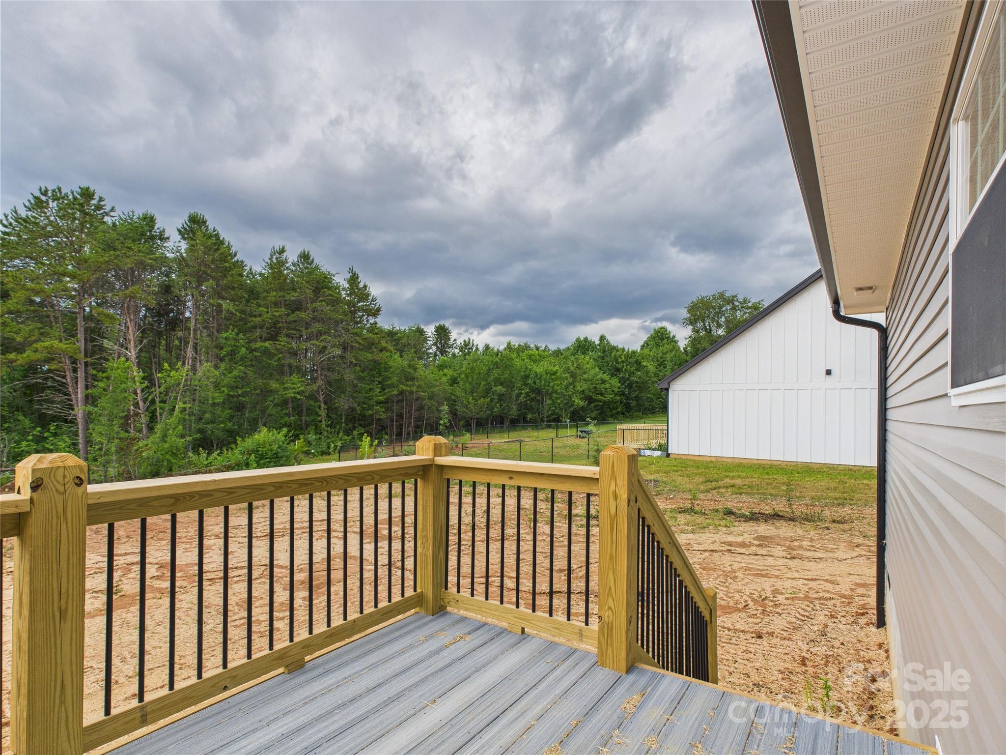 3016 Icard Rhodhiss Road Connelly Springs, NC 28612 - Photo 19 of 20 a view of balcony with wooden floor and fence