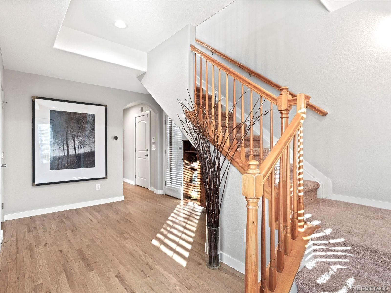 2230 Valentia Street Denver, CO 80238 - Photo 16 of 18 a view of entryway with wooden floor