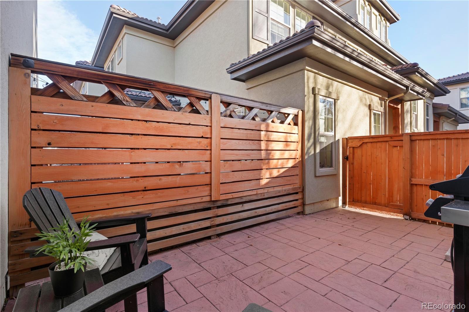 2230 Valentia Street Denver, CO 80238 - Photo 17 of 18 a view of a house with a door