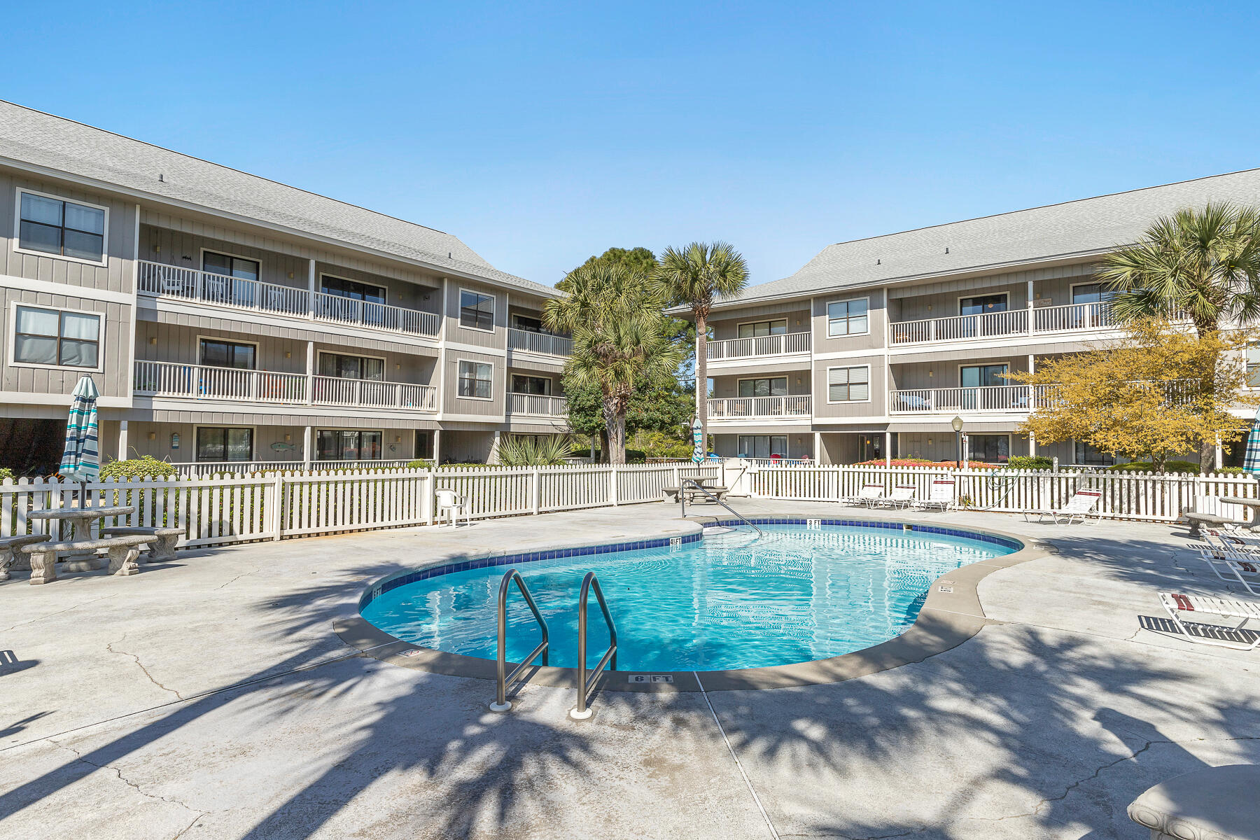 3799 East County Highway 30A, Unit D10 Santa Rosa Beach, FL 32459 - Photo 14 of 42 a view of a house with swimming pool and sitting area
