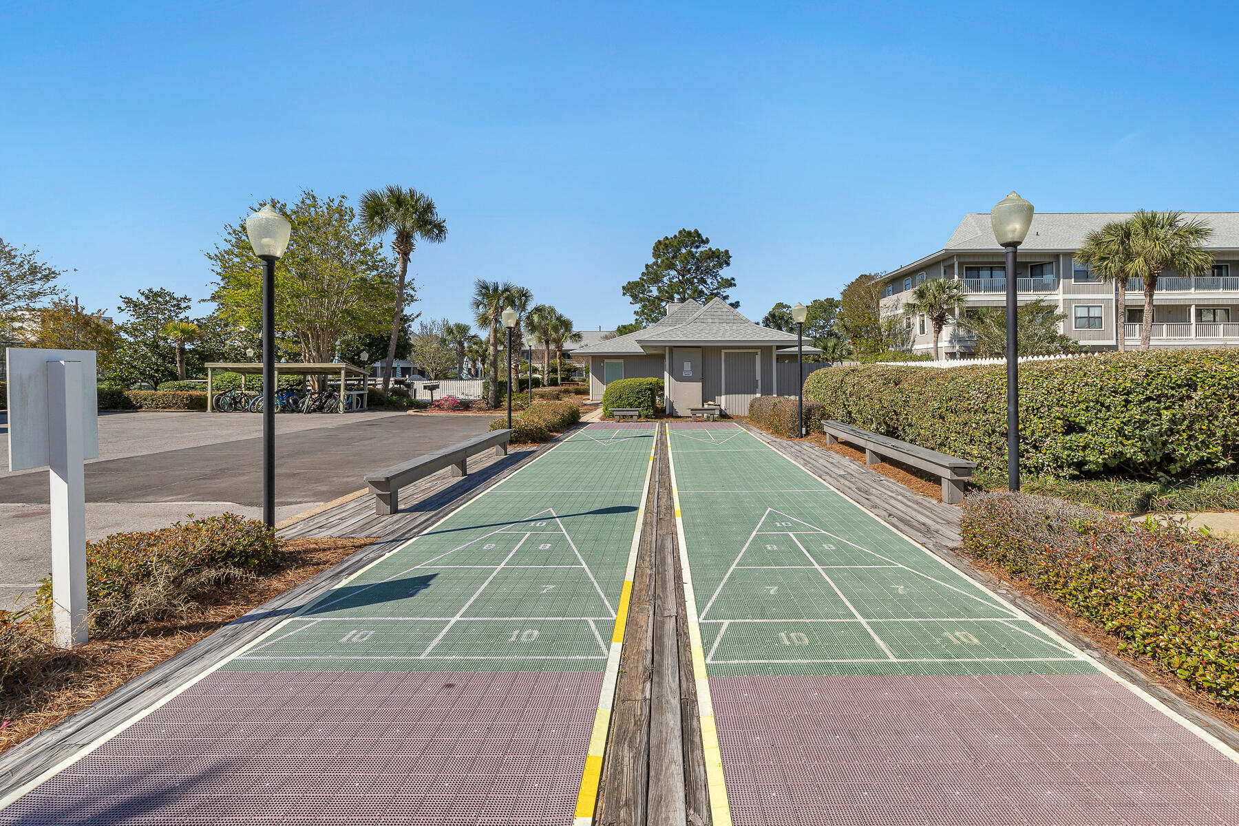 3799 East County Highway 30A, Unit D10 Santa Rosa Beach, FL 32459 - Photo 19 of 42 a view of a tennis ground with large trees