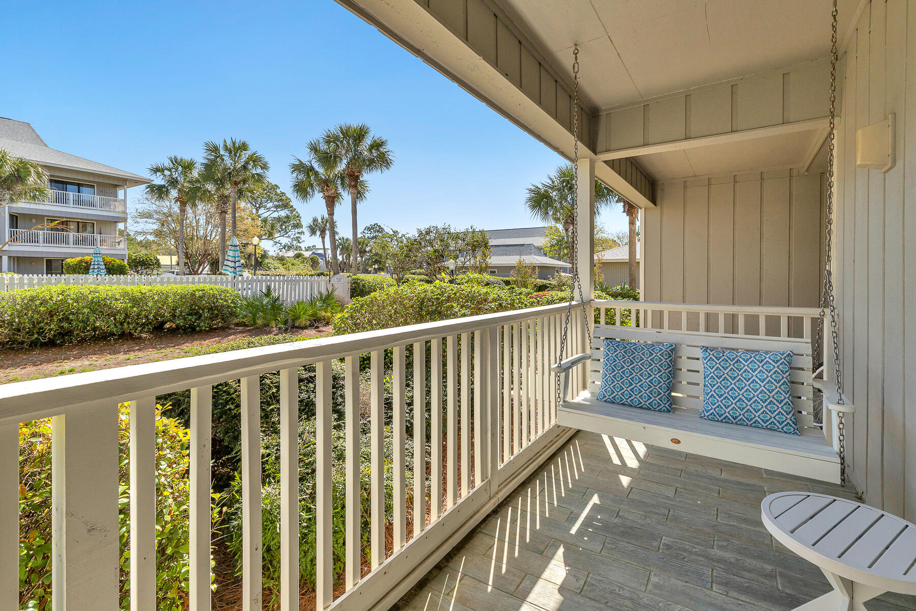 3799 East County Highway 30A, Unit D10 Santa Rosa Beach, FL 32459 - Photo 33 of 42 a view of a balcony with wooden floor