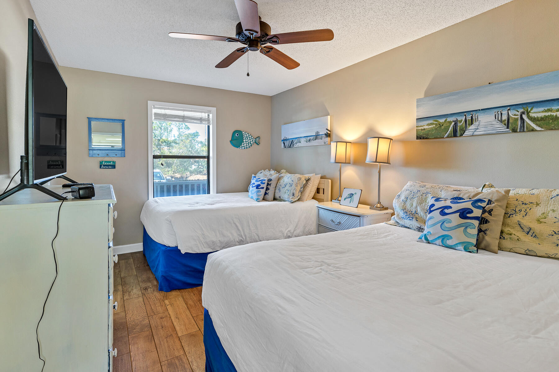 3799 East County Highway 30A, Unit D10 Santa Rosa Beach, FL 32459 - Photo 38 of 42 a bedroom with two beds and a window