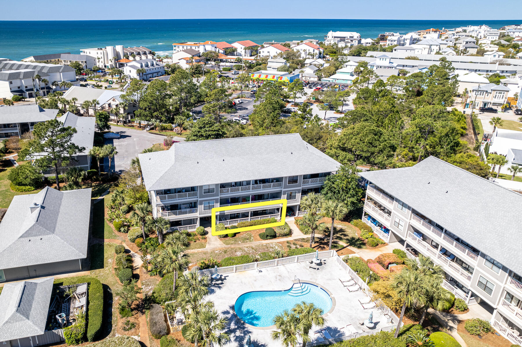 3799 East County Highway 30A, Unit D10 Santa Rosa Beach, FL 32459 - Photo 4 of 42 an aerial view of a house with a yard swimming pool and outdoor seating