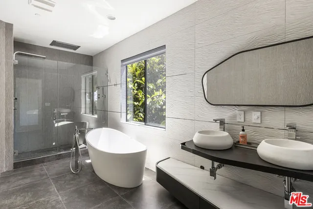 a room with a two chairs and a table