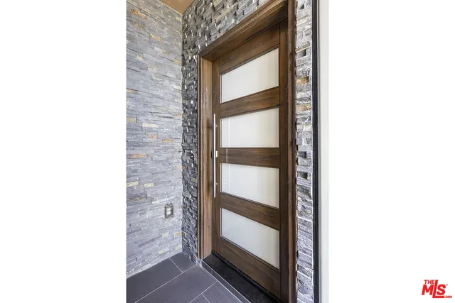 a picture of a room with a door