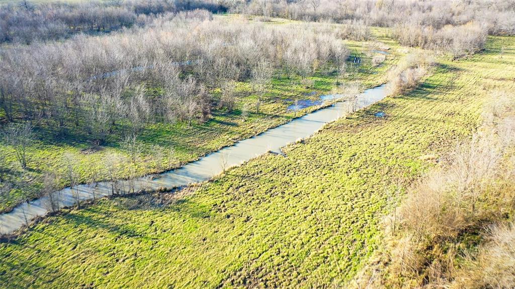 36330 Co Road Sumner, TX 75486 - Photo 18 of 40 a view of swimming pool from a garden