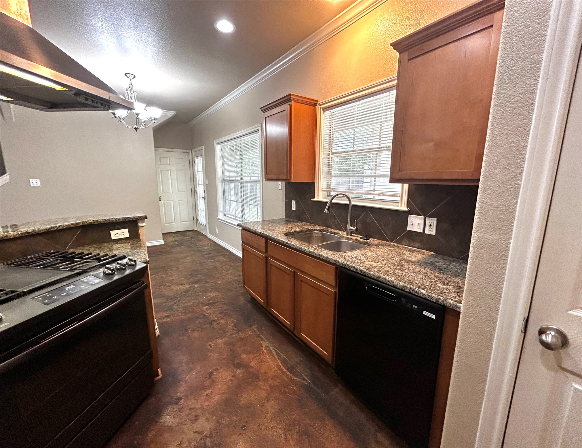 408 Nelray Boulevard, Unit A Austin, TX 78751 - Photo 13 of 36 a large kitchen with granite countertop a stove and a sink