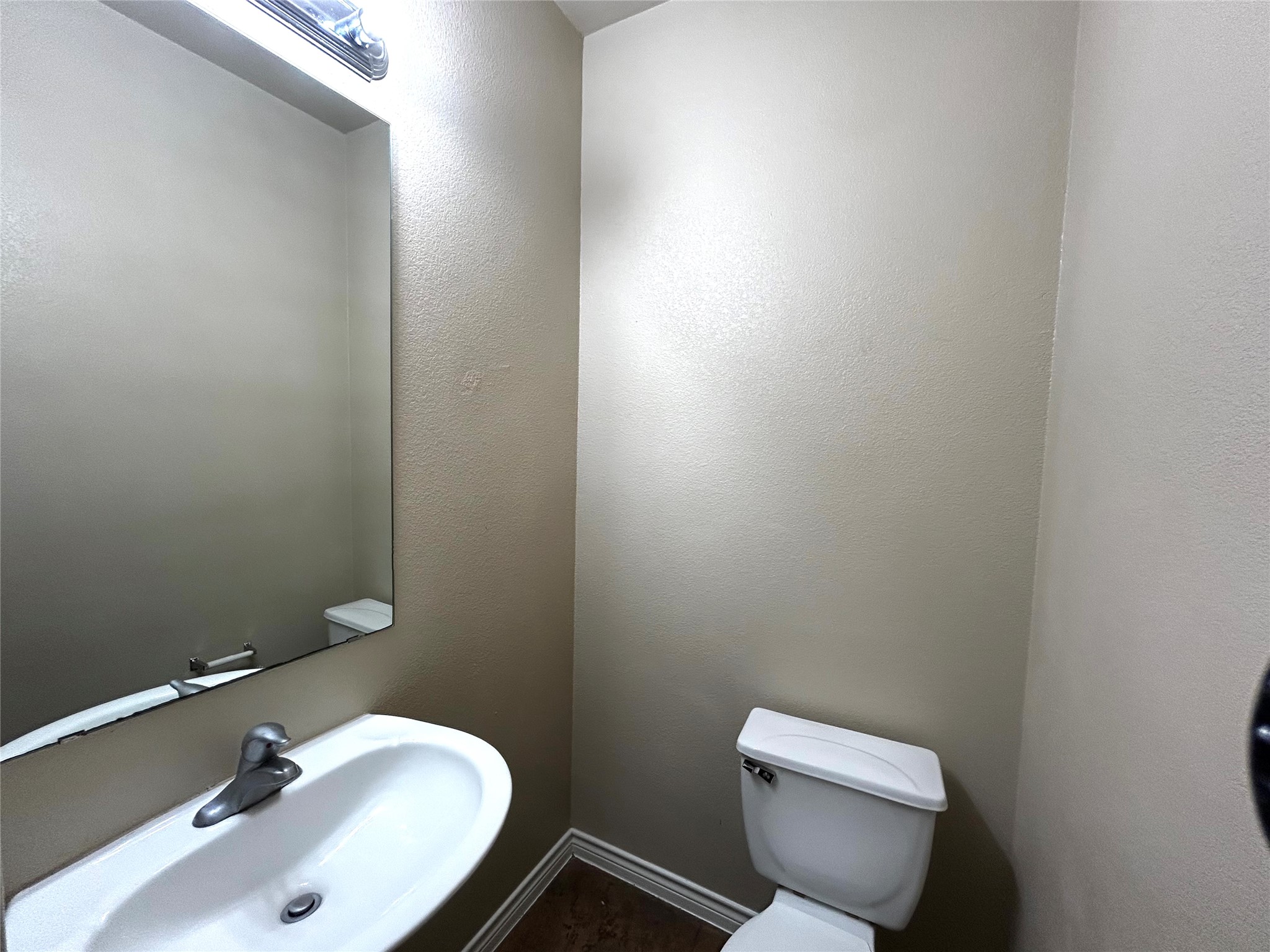 408 Nelray Boulevard, Unit A Austin, TX 78751 - Photo 15 of 36 a bathroom with a sink and a toilet