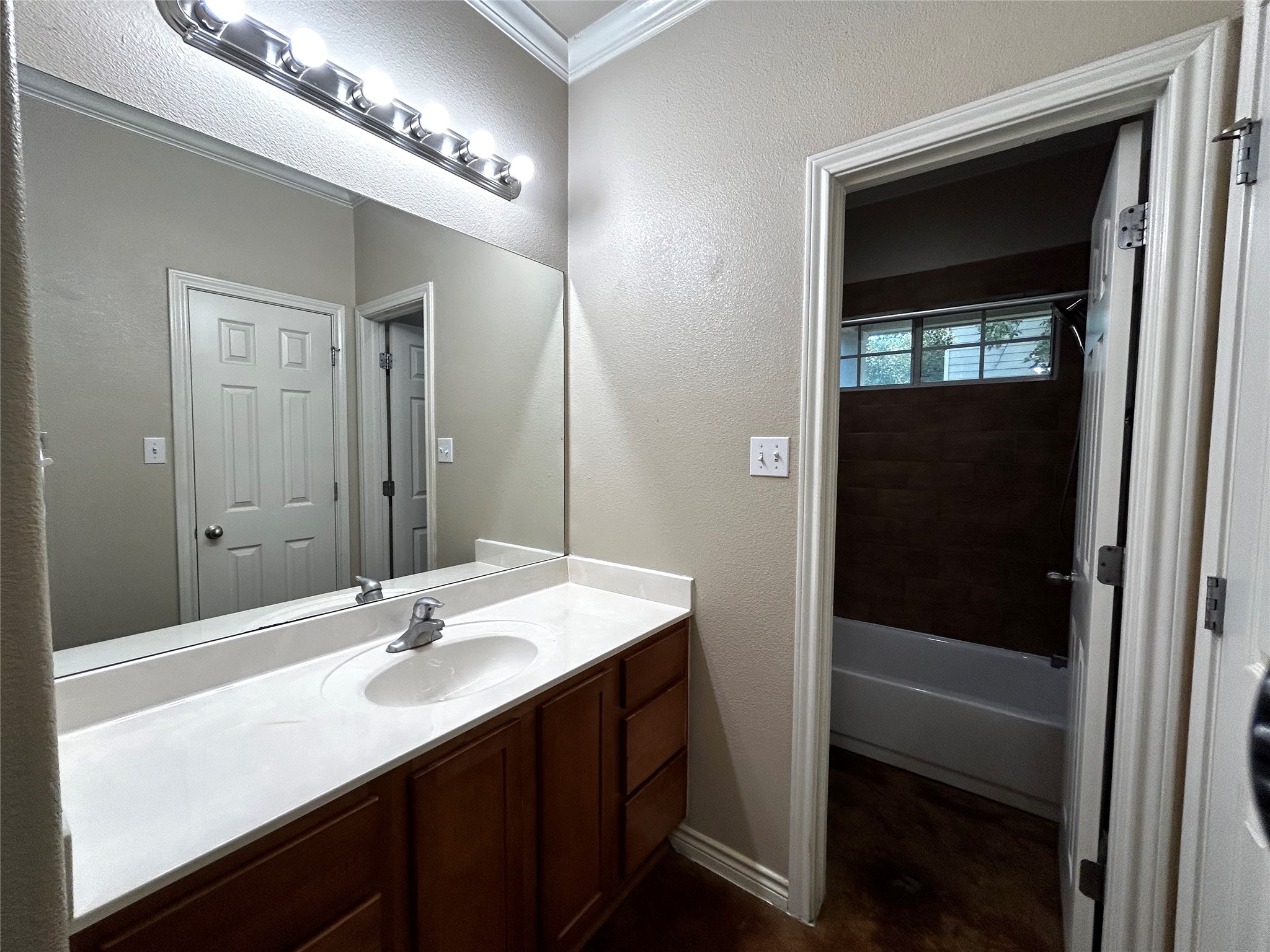 408 Nelray Boulevard, Unit A Austin, TX 78751 - Photo 19 of 36 a bathroom with a sink and a mirror