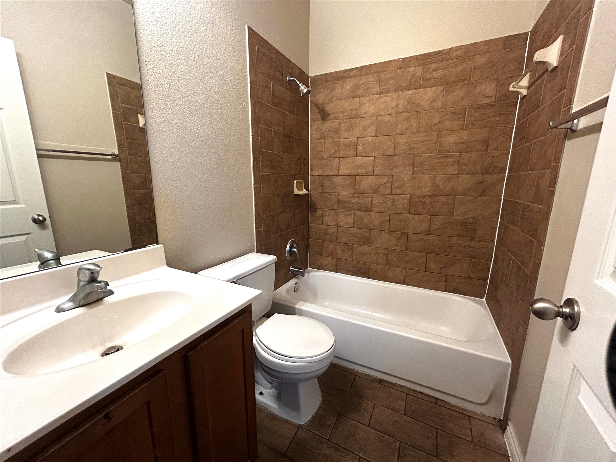 408 Nelray Boulevard, Unit A Austin, TX 78751 - Photo 24 of 36 a bathroom with a sink a toilet and a bathtub