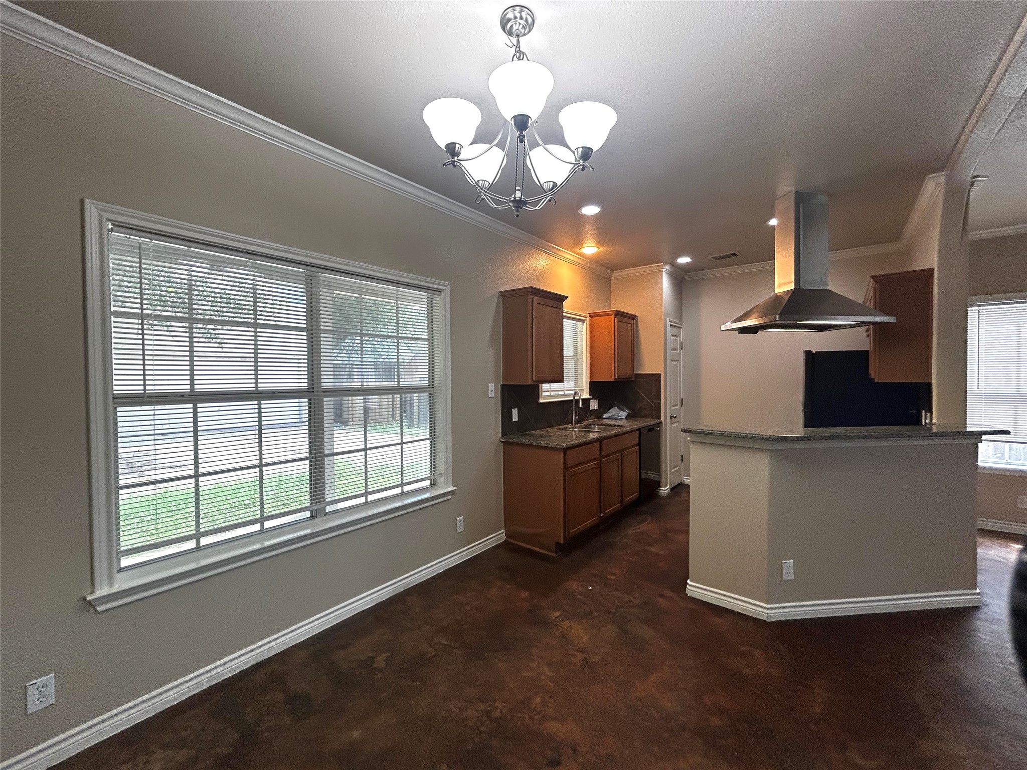 408 Nelray Boulevard, Unit A Austin, TX 78751 - Photo 7 of 36 a view of kitchen with microwave a stove and a large window