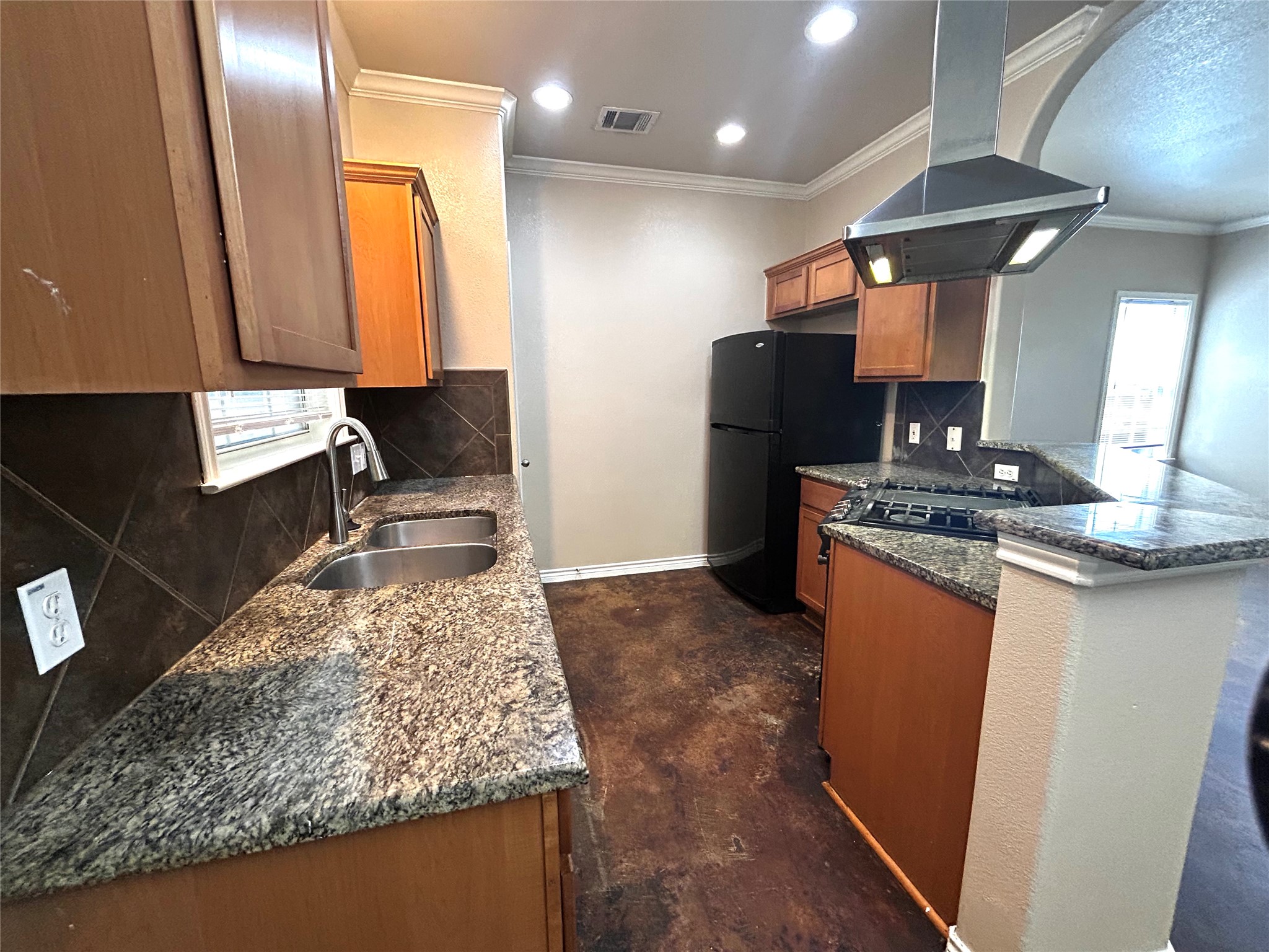 408 Nelray Boulevard, Unit A Austin, TX 78751 - Photo 9 of 36 a kitchen with stainless steel appliances granite countertop a sink stove and refrigerator