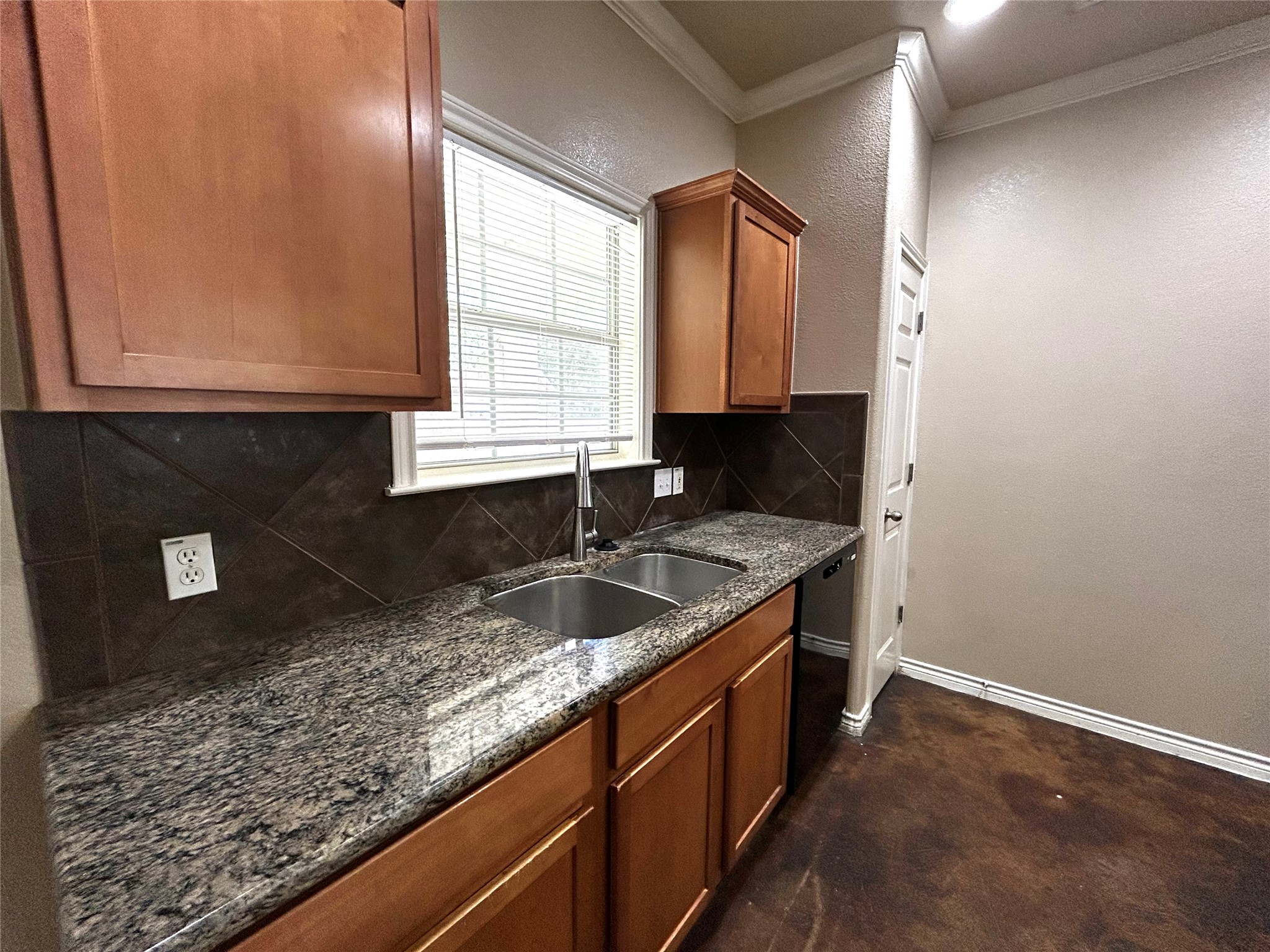 408 Nelray Boulevard, Unit A Austin, TX 78751 - Photo 10 of 36 a kitchen with granite countertop a sink and a window