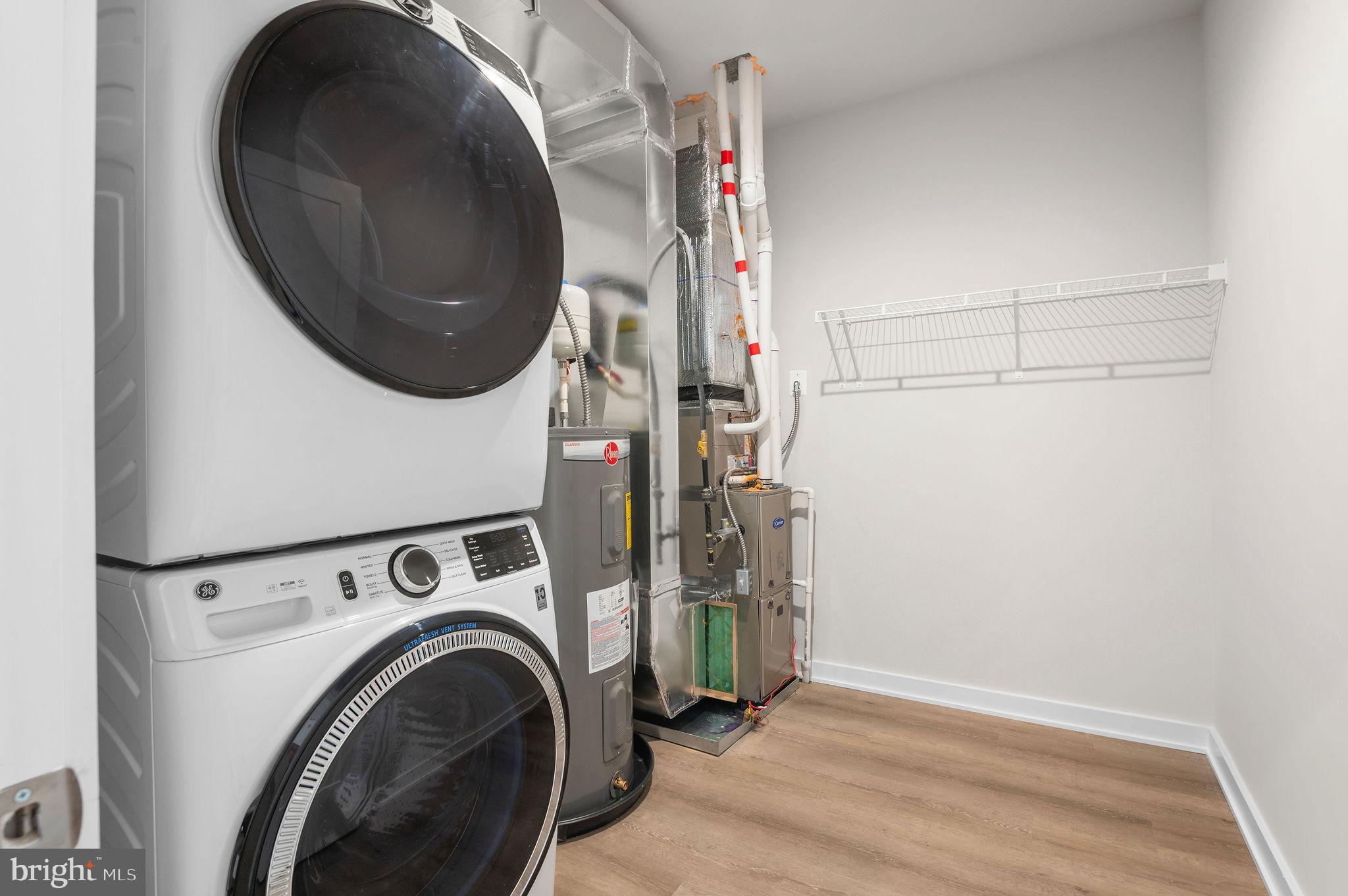 26 South York Road, Unit 209 Hatboro, PA 19040 - Photo 9 of 51 a utility room with dryer and washer
