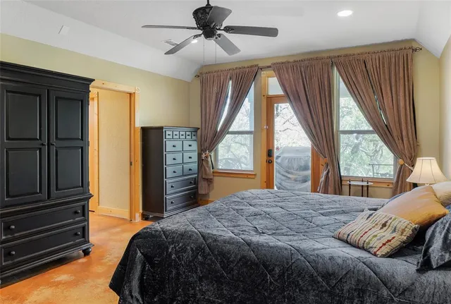 a white bath tub sitting in front of a window