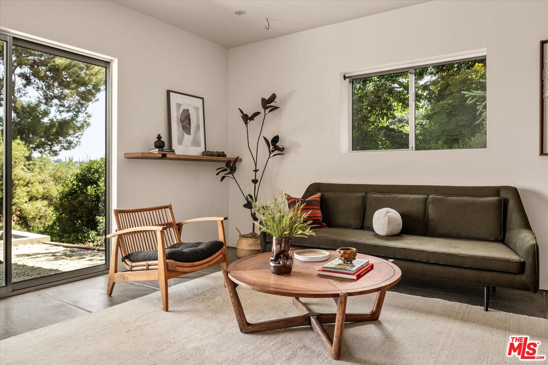 1072 Montecito Drive Los Angeles, CA 90031 - Photo 16 of 30 a living room with furniture and a potted plant