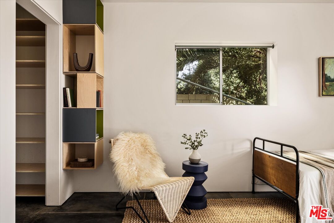 1072 Montecito Drive Los Angeles, CA 90031 - Photo 17 of 30 a living room with furniture and a window