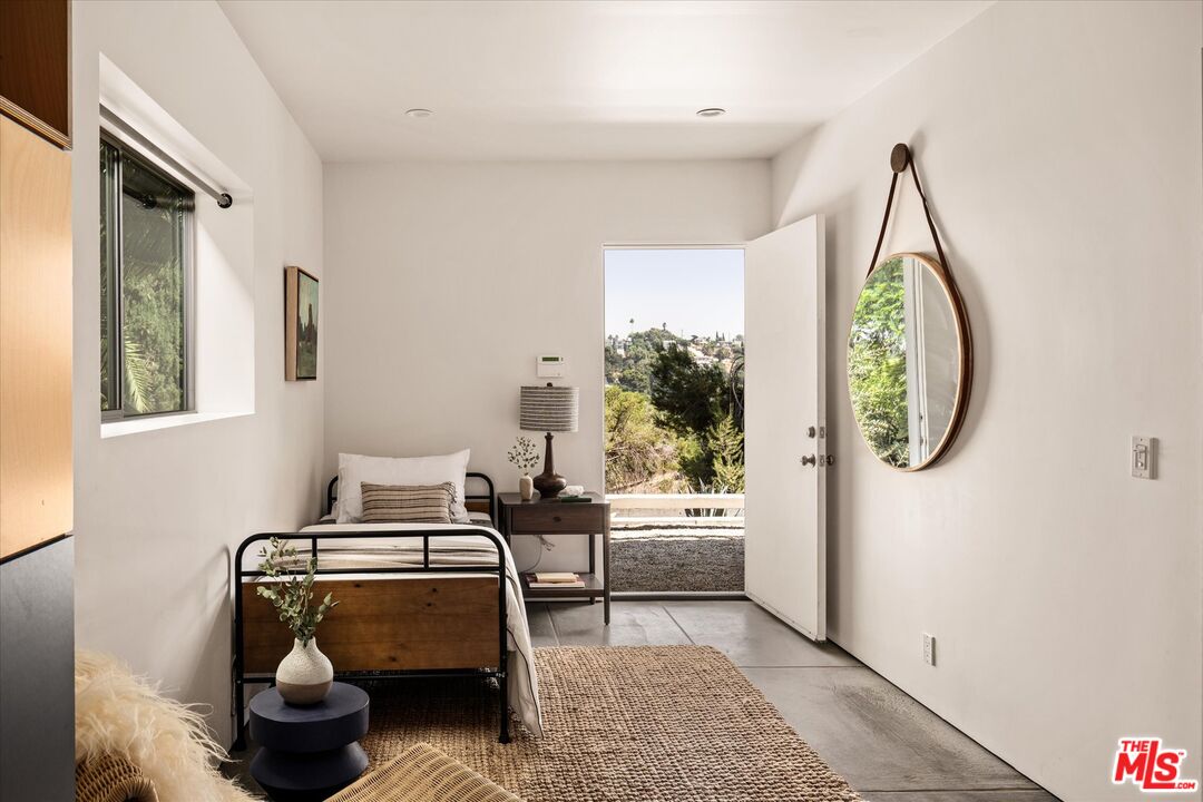 1072 Montecito Drive Los Angeles, CA 90031 - Photo 18 of 30 a living room with furniture and a window