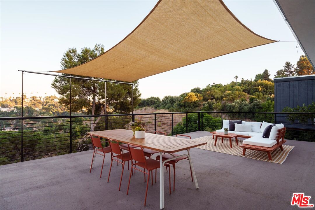 1072 Montecito Drive Los Angeles, CA 90031 - Photo 22 of 30 a view of a patio with a table and chairs
