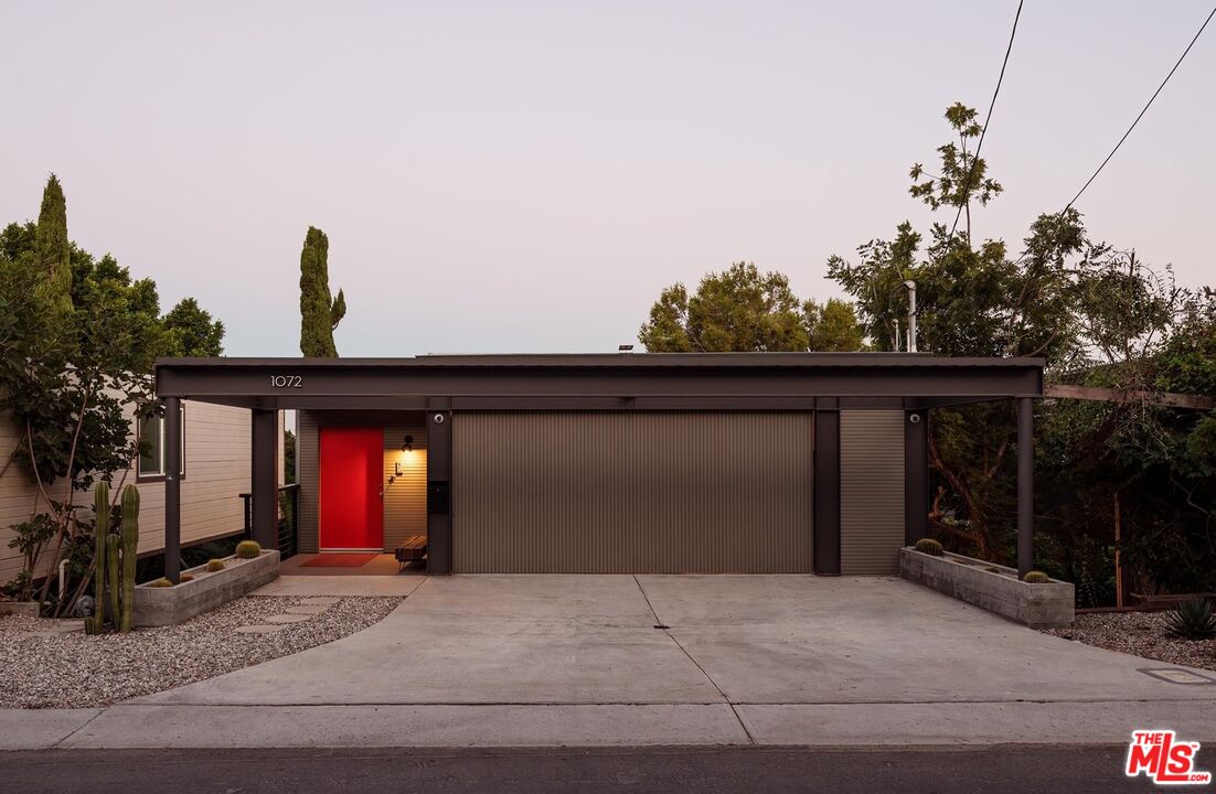 1072 Montecito Drive Los Angeles, CA 90031 - Photo 29 of 30 a front view of a house with yard