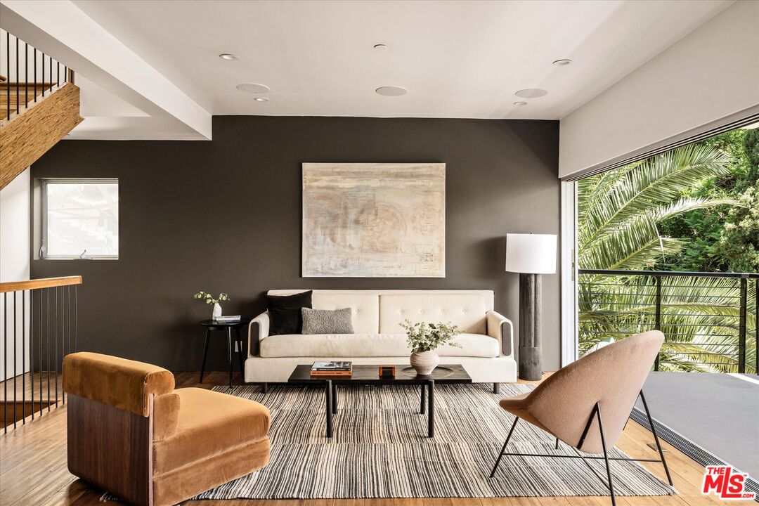 1072 Montecito Drive Los Angeles, CA 90031 - Photo 7 of 30 a living room with furniture and a large window