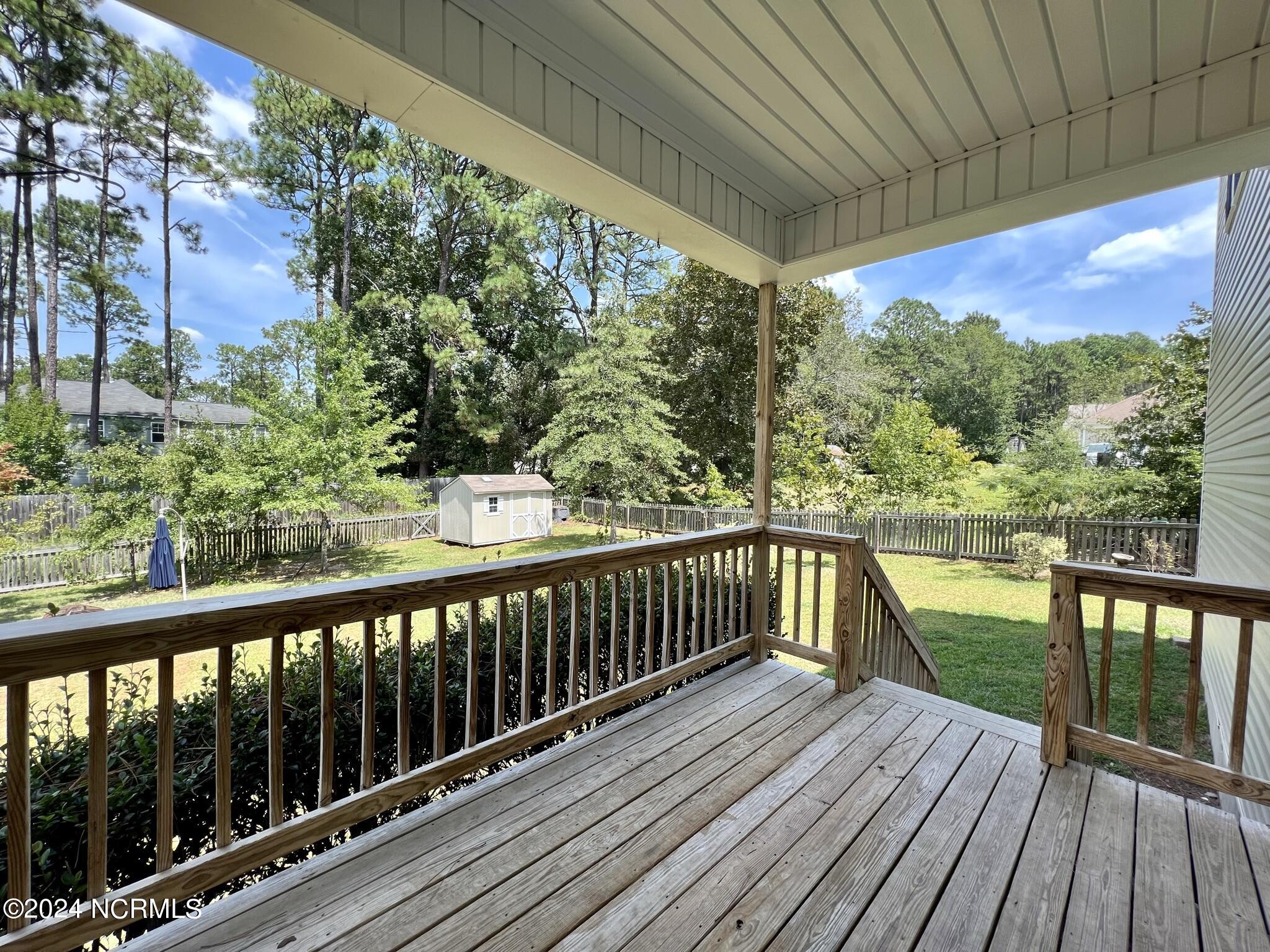 712 Sun Road Aberdeen, NC 28315 - Photo 33 of 39 712 Sun Road Covered Back Deck