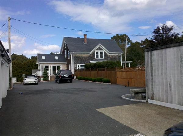 562 Reed Road Dartmouth, MA 02747 - Photo 6 of 12 a view of a street with a building in the background