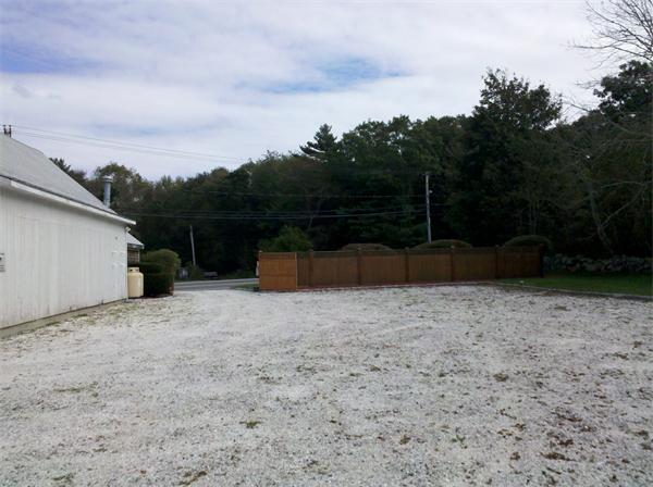 562 Reed Road Dartmouth, MA 02747 - Photo 9 of 12 a backyard of a house with lots of green space and mountain view