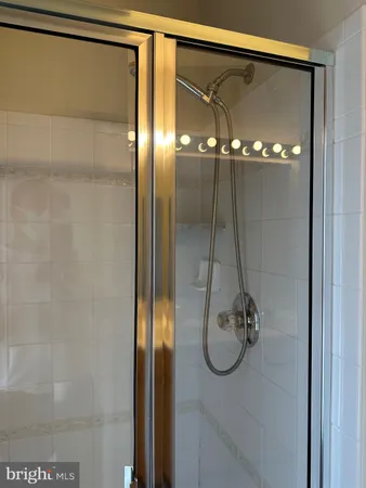 a bathroom with a bathtub and a sink
