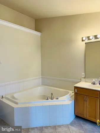 a view of an empty room and a window