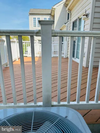 a view of front door with balcony