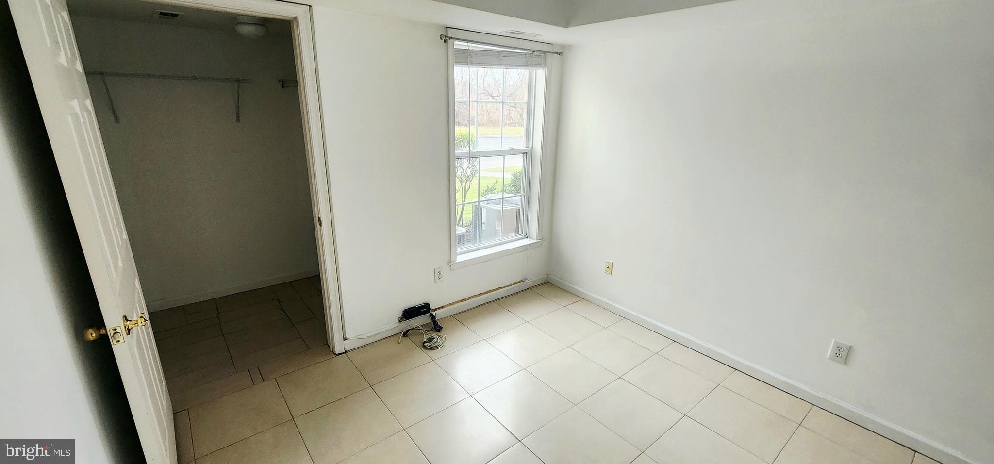 1864 Gibson Road Bensalem, PA 19020 - Photo 13 of 20 a view of an empty room with a window