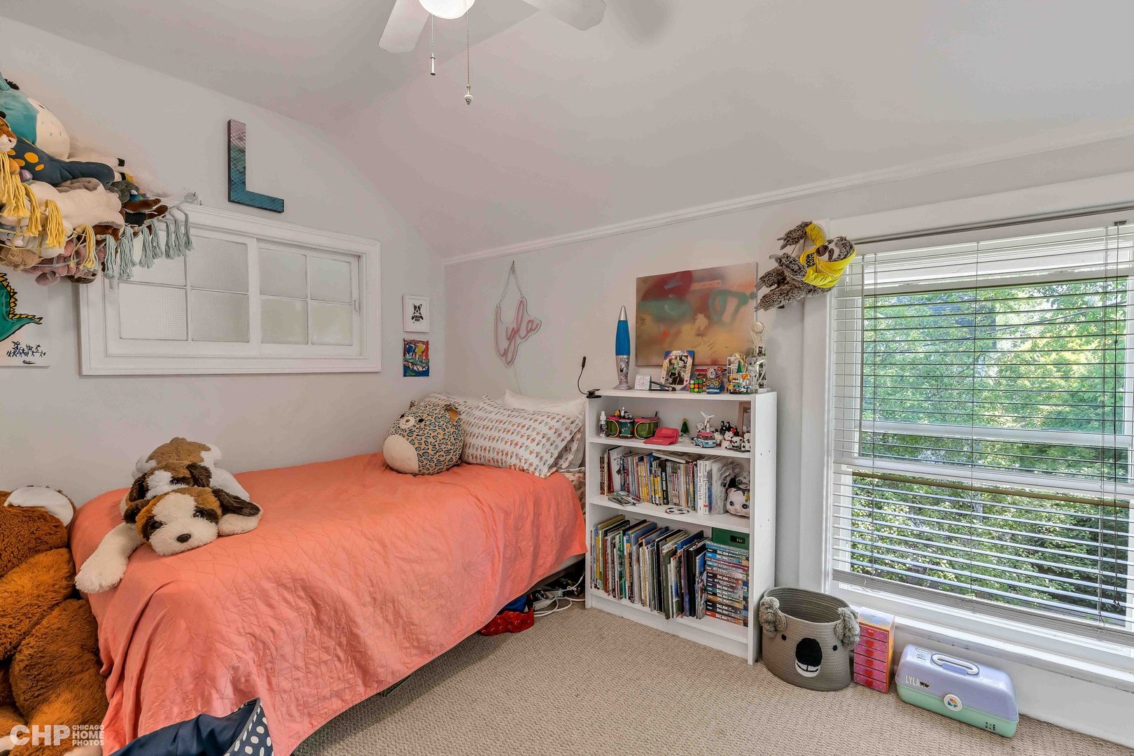 936 Spruce Street Winnetka, IL 60093 - Photo 16 of 38 a bedroom with a bed and a large window