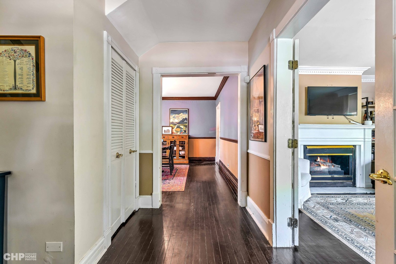 936 Spruce Street Winnetka, IL 60093 - Photo 2 of 38 a view of a hallway view with living room and wooden floor